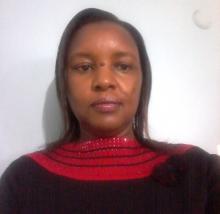 Dr. Judith Mbau